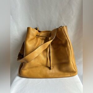 Prada yellow pebbled leather Bucket Bag